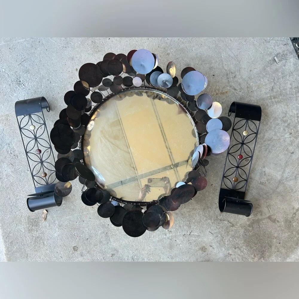 Beautiful wall mirror and sconce set. Can easily be painted to another color.